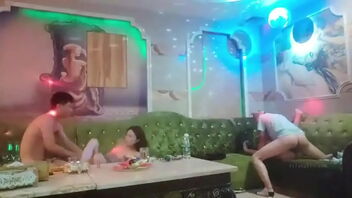 Gang sex in a Chinese KTV bar with a kinky sitting doll